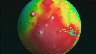 link to multimedia item number 655 entitled 'Tharsis Rise (False Color)'. Description is 'Flyover of Mars topography globe in Tharsis region with false color texture'