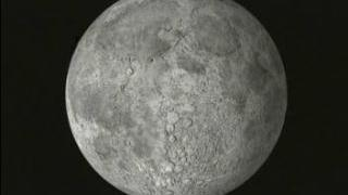 link to multimedia item number 676 entitled 'Airbrushed Moon'. Description is 'True Color Moon Rotating (1 minute) using Clementine
surface texture map'