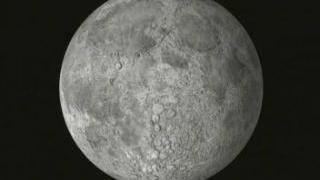 link to multimedia item number 680 entitled 'True Color Moon using USGS Airbrush Texture'. Description is 'True Color (airbrushed) Moon. Showing the south pole, the crash
site of the Lunar Prospector.'