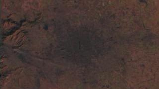 link to multimedia item number 864 entitled 'Beijing Flyby'. Description is 'A flyby of Beijing, from Landsat data'