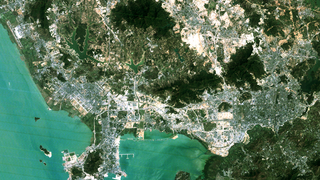 link to multimedia item number 1058 entitled 'Shenzhen, China Land Use - True Color Fade 1988 to 1996'. Description is 'True color Landsat image, Shenzhen, China, 1996.'