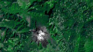 link to multimedia item number 2103 entitled 'Time Heals all Wounds: A look at Mt. St. Helens (Slower Dissolve)'. Description is 'Looking at Landsat images of Mt. St. Helens, Looking at the regrowth after the disaster.'