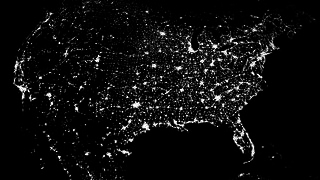 link to multimedia item number 2396 entitled 'The Lights of Earth: United States'. Description is 'The above image is actually a composite of hundreds of pictures
made by the Defense Meteorological Satellite Program (DMSP) currently operates four
satellites carrying the Operational Linescan System (OLS) in low-altitude polar orbits.'