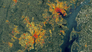 link to multimedia item number 2634 entitled 'Impervious Data of the Washington, DC and Baltimore, Maryland Area'. Description is 'This Landsat data from 1986 of the Washington-Baltimore area, however a special algorithm has been applied to it to illuminate the changes in low-density residential land use which exemplify sprawl.'