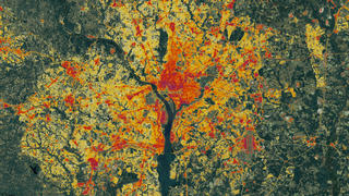link to multimedia item number 2636 entitled 'Impervious Data of the Washington, DC Area'. Description is 'This Landsat data from 1986 of the Washington area, however a special algorithm has been applied to it to illuminate the changes in low-density residential land use which exemplify sprawl.'