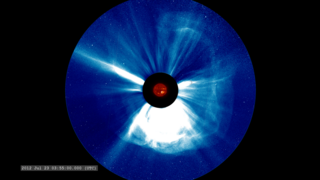 The resulting coronal mass ejection (CME) erupts in a 'halo' form, suggesting the CME could be heading away from, or toward, the STEREO-A spacecraft.  This image is a combination of the EUVI 304 angstrom images and the STEREO-A COR2 coronagraph.