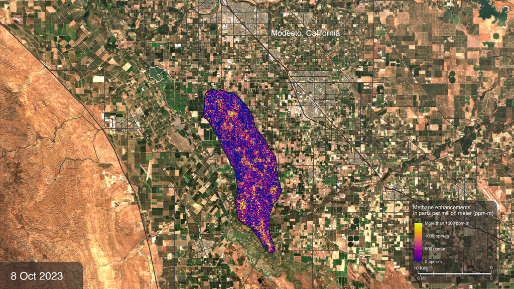 A region of enhanced methane is visible near Modesto, California. This version of the data visualization includes location label.