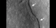 Newly discovered cliffs in the lunar crust indicate the moon shrank globally in the geologically recent past and might still be shrinking today, according to a team analyzing new images from NASA's Lunar Reconnaissance Orbiter (LRO) spacecraft. The results provide important clues to the moon's recent geologic and tectonic evolution.   For complete transcript, click  here .