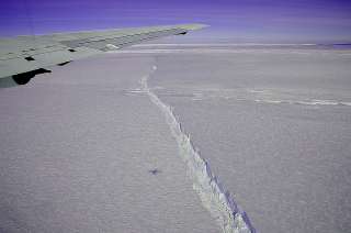 NASA's DC-8 flew over the Pine Island Glacier Ice Shelf on Oct. 14, 2011, as part of Operation IceBridge.  A large, long-running crack was plainly visible across the ice shelf.  The DC-8 took off on Oct. 26, 2011, to collect more data on the ice shelf and the crack.  The area beyond the crack that could calve in the coming months covers about 310 square miles (800 sq. km).