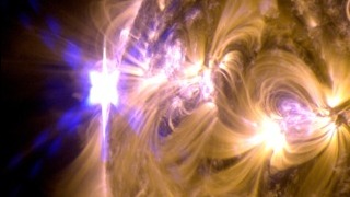 The sun erupted with an X1.7-class solar flare on May 12, 2013.  This is a blend of two images of the flare from NASA's Solar Dynamics Observatory (SDO) — one image shows light in the 171 angstrom wavelength, the other in 131 angstroms.  Credit: NASA/SDO/AIA