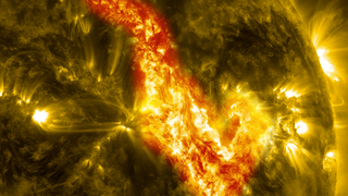 Short video with music.  The image is a composite of SDO AIA 171 and 304, with the two wavelengths blended in the area of the canyon.      Watch this video on the  NASAexplorer YouTube channel.     For complete transcript, click  here .