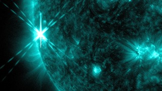 X1.7 flare from 4:01am EDT Oct 25 2013, viewed in SDO AIA 131.  Cropped.