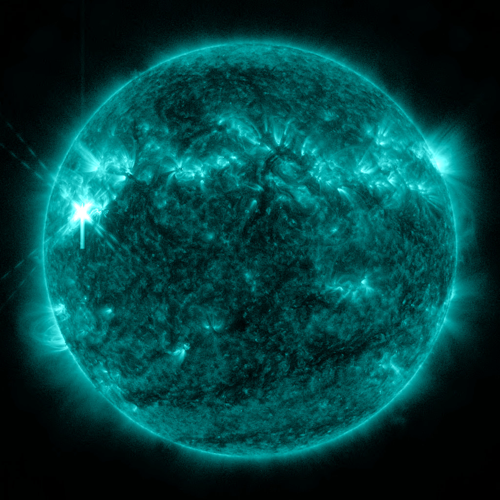 Still of the Nov. 6th M5.2 solar flare captured by SDO in 131 angstrom light. This wavelength highlights hot, flaring regions and shows the flare in the upper left corner of the Sun.Credit: NASA/SDO