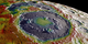A high-resolution free-air gravity map based on GRAIL data, overlaid on terrain based on LRO altimeter (LOLA) and camera (LROC) data. The view is south-up, with the south pole near the horizon in the upper left and the crescent Earth in the distance. The terminator crosses the eastern rim of the Schrödinger basin. Gravity is painted onto the areas that are in or near the night side. Red corresponds to mass excesses and blue to mass deficits.