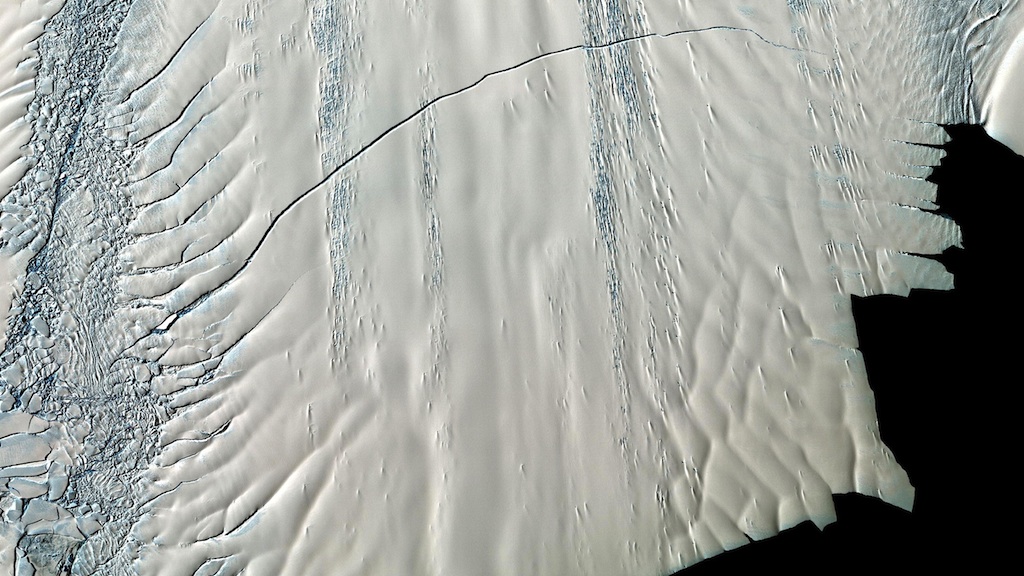 The crack, seen by NASA's Terra satellite in Nov. 2011. As of Apr. 2012, the crack has yet to reach across the ice shelf and release an iceberg.