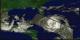 A fly-in to Hurricane Georges on September 23, 1998, showing the three-dimensional structure of the precipitation as measured by the Precipitation Radar instrument on TRMM.  In this animation, a surface of constant precipitation is colored by the value of the precipitation on the ground under the surface.