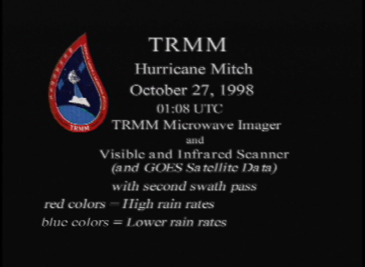 Video slate image reads "TRMM Hurricane Mitch October 27, 1998 01:08 UTC TRMM Microwave Image and Visible and Infrared Scanner (and GOES Satellite Data) with second swath pass; red colors = High rain rates; blue colors = Lower rain rates".