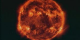 A zoom into a composite solar image created from TRACE observations made on October 10, 1998, followed by a pan showing various active regions in the solar corona