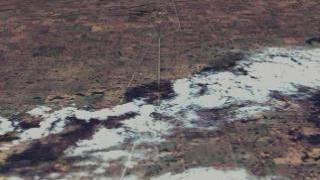 Flying down Interstate 90 to Sioux Falls, South Dakota using an image from Landsat 7 taken April 22, 1999