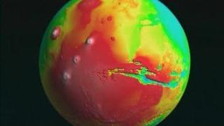 Flyover of Valles Marineris on Mars topography globe with false color texture