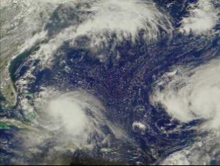 Hurricane Dennis and tropical storm Cindy on Aug. 27, 1999.