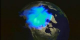 Visible aurora over the North Pole on May 11, 1999 as measured by Polar