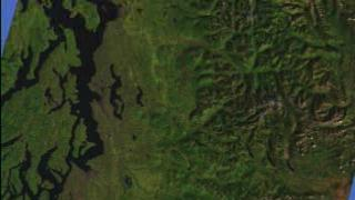 A flyby of the area around Seattle, Washington, using Landsat imagery draped over elevation data