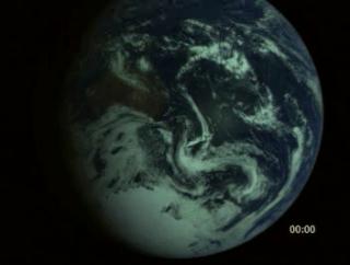 An animation of the Earths rotation from Galileo imagery at 100 times real-time.  The timer indicates hours and minutes of elapsed time.  Motion is perceptible.