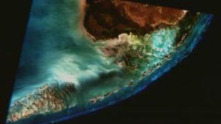  With the Landsat 7 data we can rigorously test hypotheses about
how entire reef ecosystems form,— says coral reef ecologist Bruce Hatcher of Dalhousie
University—We no longer are limited to the observations we can collect by wandering
around in small boats and sampling individual reefs to infer large-scale processes from
a few samples. 