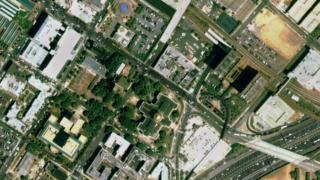 A seamless zoom from space to the ground, using data from Terra-MODIS, Landsat-ETM+, and IKONOS, and ending at the State Capitol Building in Atlanta, Georgia.