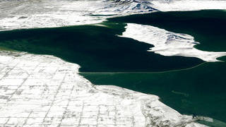 This image is of the Great Salt Lake, looking south
towards Salt Lake City, Utah.