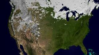 This still image shows snow cover over the US on Feburary 21, 2002.