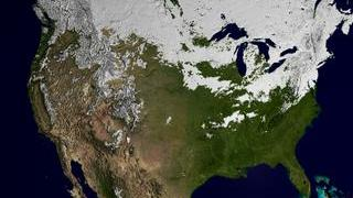 This still image shows snow cover over the US on Feburary 21, 2003.