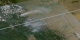 Close-up view of the smoke plumes.