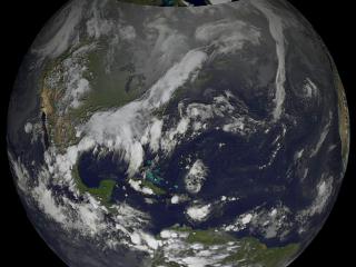 This visualization shows GOES cloud imagery.  Tropical disturbances can be seen coming off the west coast of Africa.  Some of these distrubances become hurricanes.  