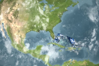 Hurricane Katrina moves slowly toward Florida and dumps 6 to 10 inches of accumulated rainfall over the region.  In this animation, the amount of rainfall can be seen through color. blue is 0.25 inches per hour.  Green is 0.5 inches per hour.  Yellow is 1 inch per hour and red is 2 or more inches per hour.