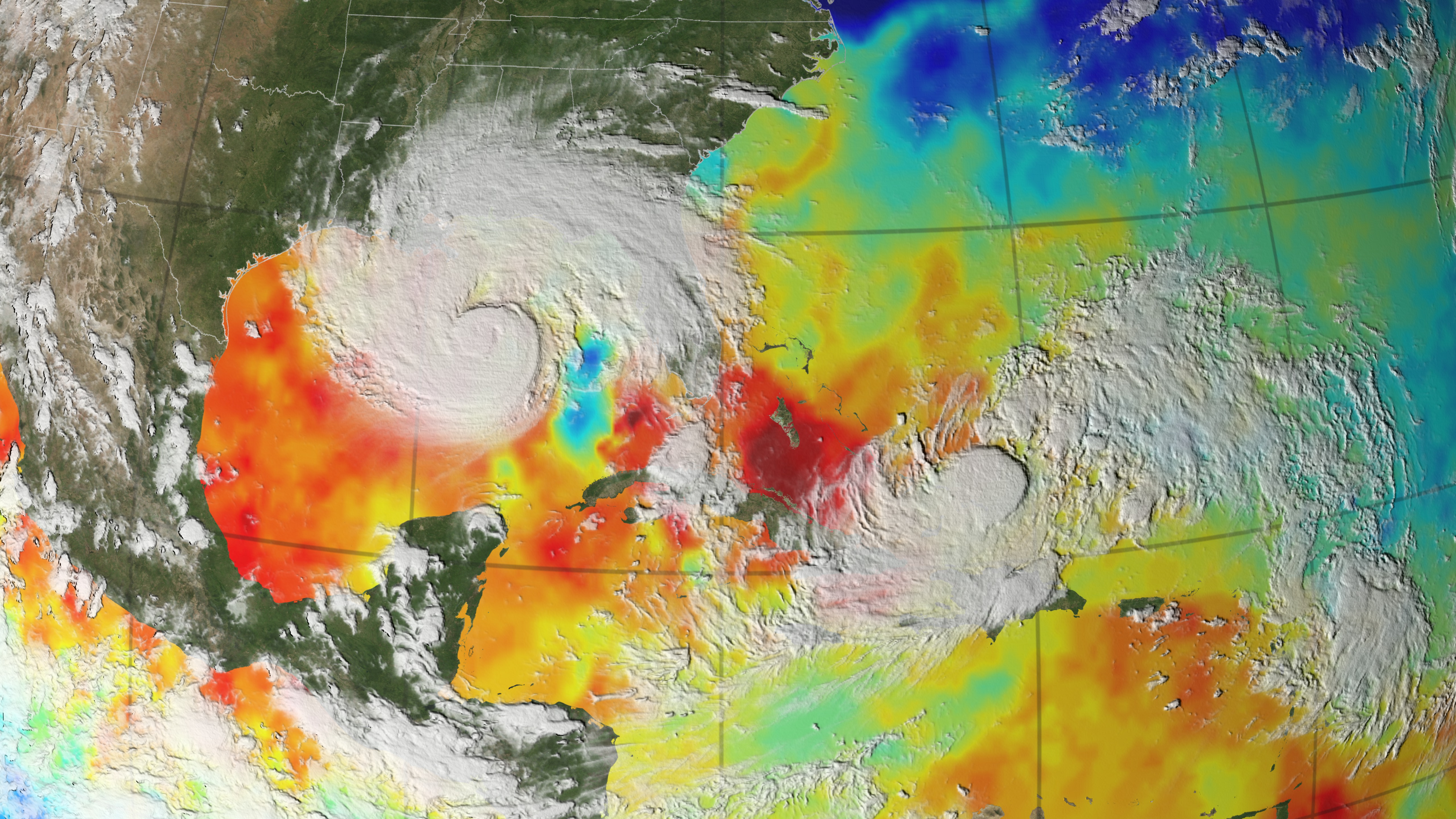 Still image of Hurricane Gustav and Tropical Storm Hanna on August 31 2008, showing the cold trail in sea surface temperature on the east side of Gustav.