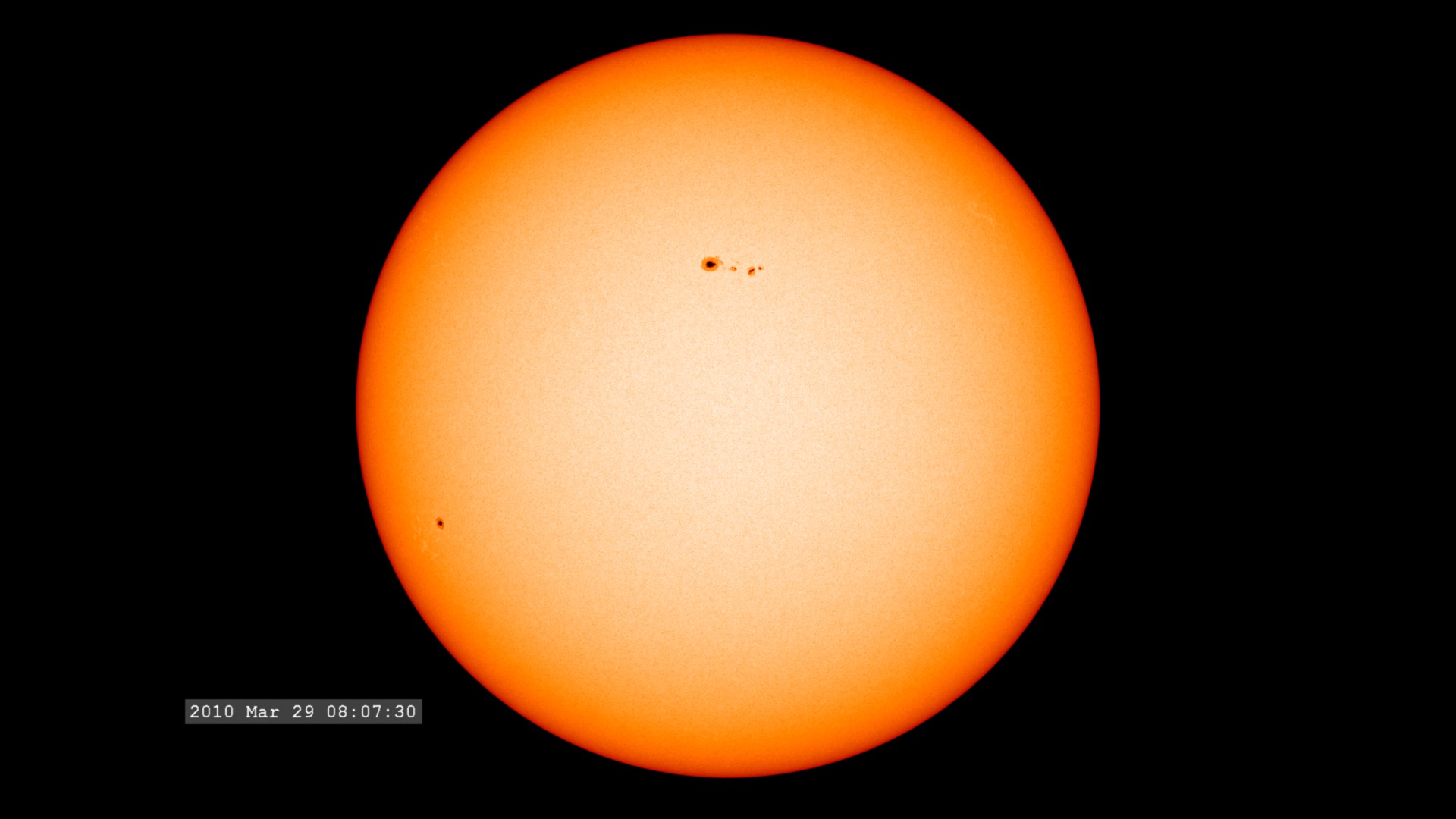 This movie is a full disk view of a large sunspot group visible shortly after HMI turned on their imagers.