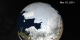 An animation of the Arctic sea ice from September 17th 2009 through March 16, 2011 with a date overlay and a star background.