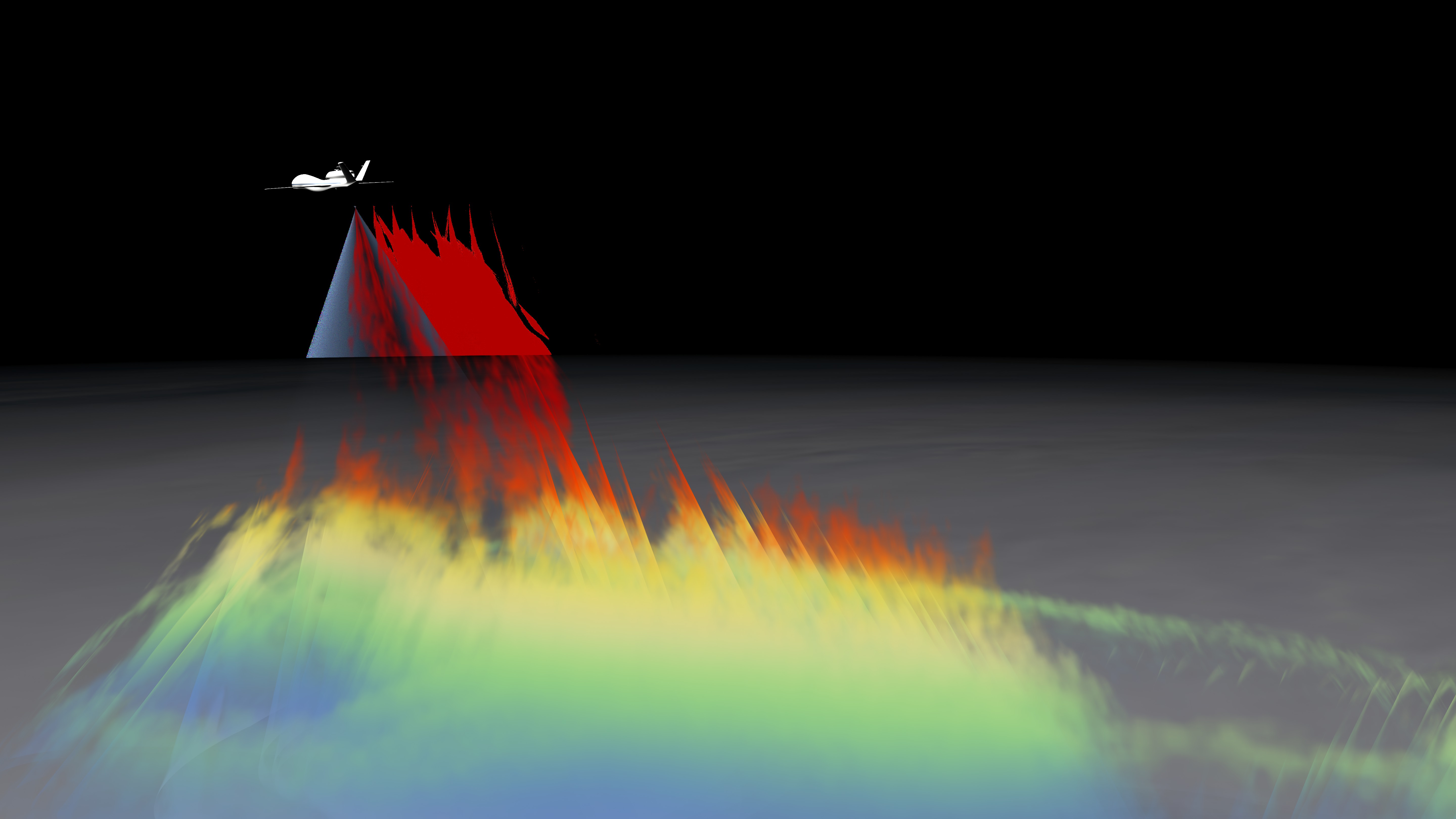 The Global Hawk UAV flies over Hurricane Karl to reveal a hot tower.  Red shows reflectivity that is 12 km from the surface, orange is 10 km, yellow is 7.5 km, green is 6 km, and blue is under 6 km.This movie shows the eyewall of the storm develop as the UAV monitors from above.