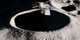 Lunar Reconnaissance Orbiter flies over Shackleton crater near the lunar south pole in this computer rendering.