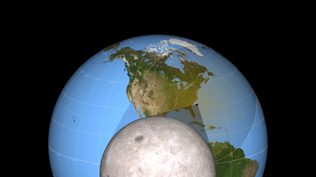 The umbral and penumbral shadow cones travel across the surface of the Earth during the August 21, 2017 total solar eclipse.