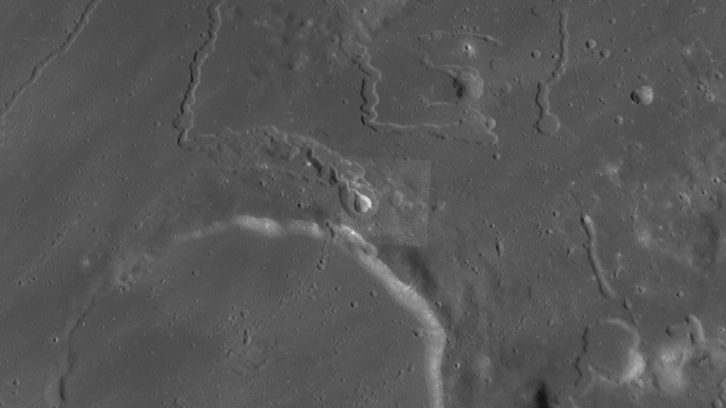 The camera zooms from an overhead, global view centered on the northern rim of Prinz crater, at 26.3&deg;N 43.7&deg;W, down to an oblique, close-up view of Vera crater and the associated rille, Rima Prinz.