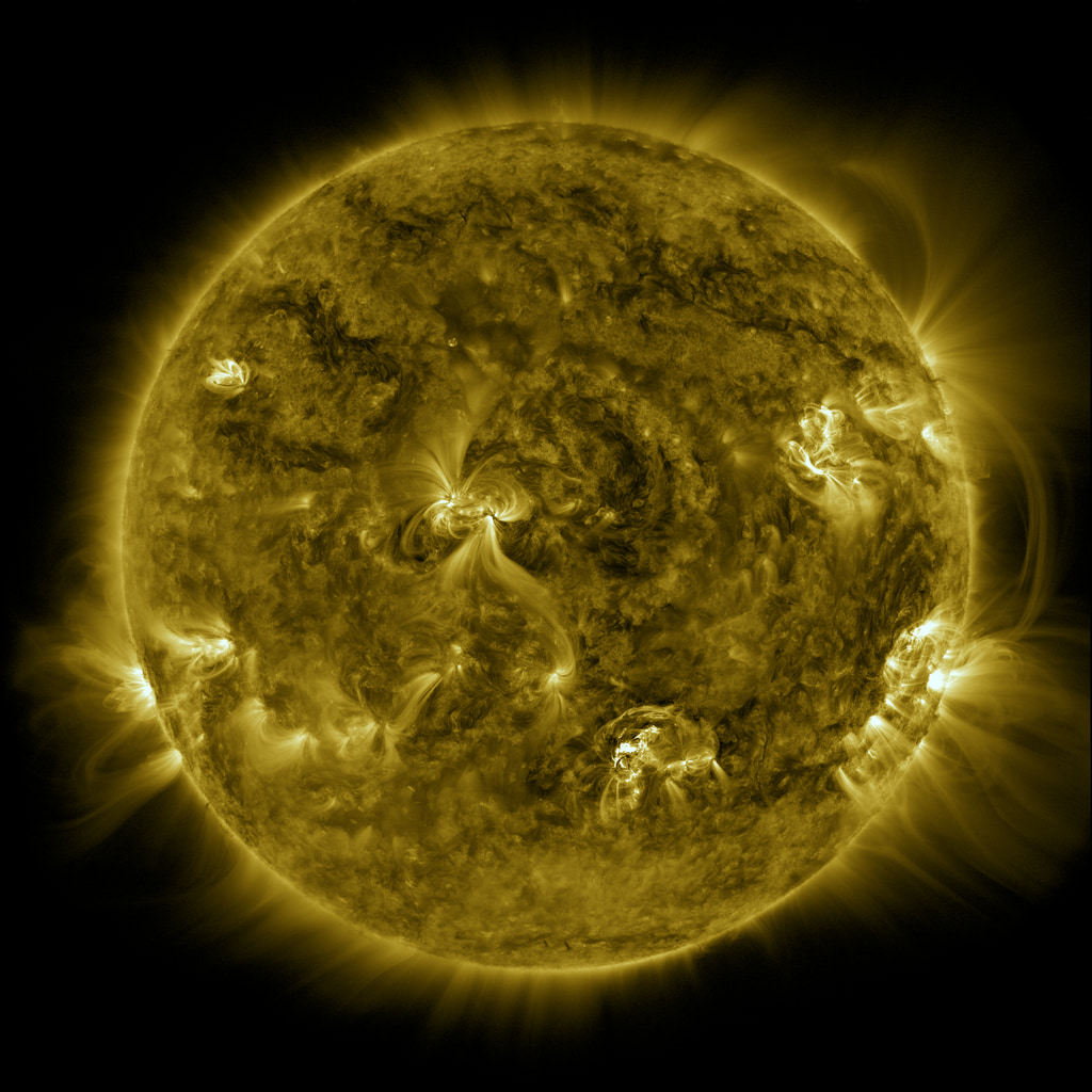The M5 solar flare (lower center of solar disk) as seen in AIA 171 Angstrom filter. Correction is applied for the instrument Point-Spread Function (PSF).