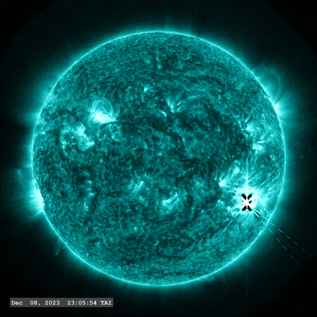 The M 5.4 flare erupts from Active Region 13511 in the lower right of the image in this view from SDO/AIA 131 angstrom filter.  The point-spread function correction (PSF) has been applied to all this imagery.