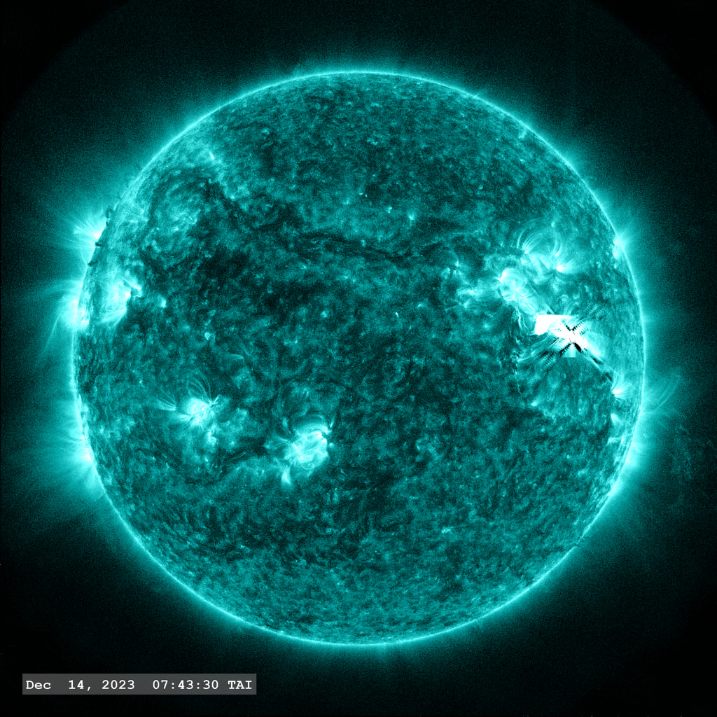 The M 5.8 flare erupts from Active Region 13514 near the right limb of the image in this view from SDO/AIA 131 angstrom filter. The point-spread function correction (PSF) has been applied to all this imagery.