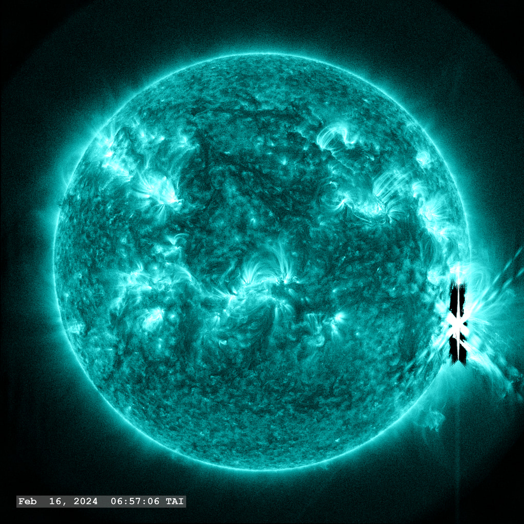 Active Region 13576, now carried by solar rotation to the lower right limb of the solar disk, launches an X2.5 class flare in this view with the SDO/AIA 131 angstrom filter.   Lots of post-flare filament activity on the limb, particularly solar material falling back towards the Sun.