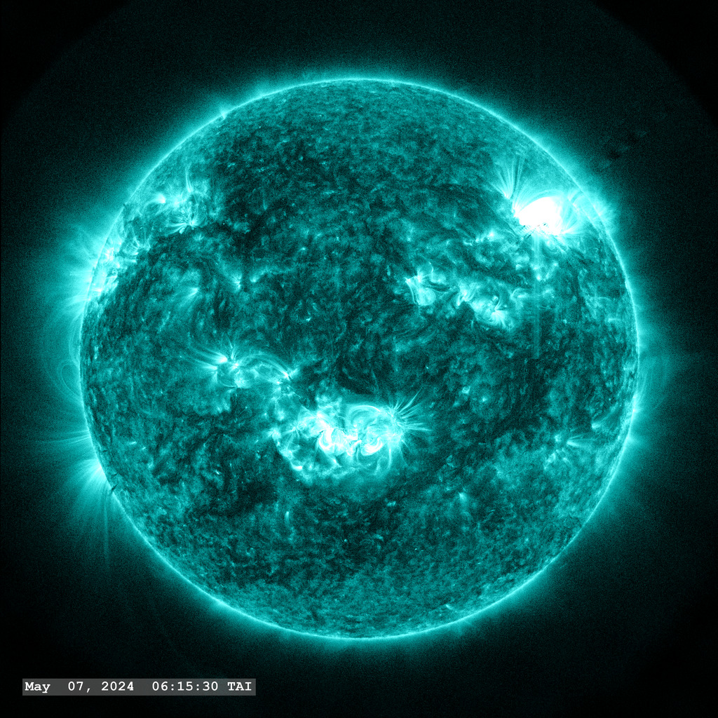The sun launches an M5.1 flare (upper right quadrant) on May 7, 2024 in this view from the SDO/AIA 131 ångstrom filter.