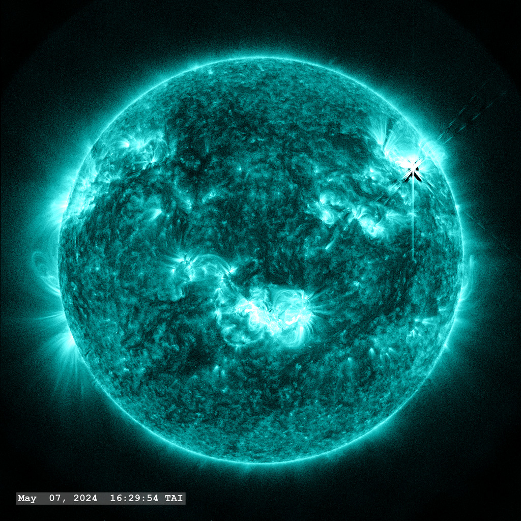 The sun launches an M8.2 flare (upper right quadrant) on May 7, 2024 in this view from the SDO/AIA 131 ångstrom filter.