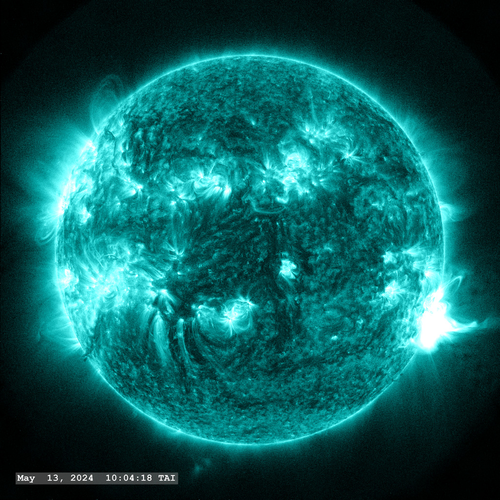 Active Region 13664 (on the lower right limb) launches an M6.6 flare in this view through the SDO AIA 131 ångstrom filter.
